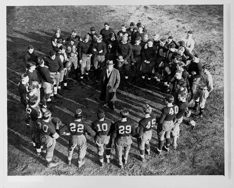 In his 39th year of coaching, Stagg stands in a circle of prospective players at the University Of Chicago. (Photo: Library Of Congress/Corbis/VCG/Getty Images)